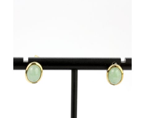 A pair of hallmarked 9ct yellow gold and jade stud earrings, L. 1.2cm.