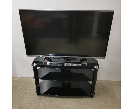 A Panasonic 42inch LCD TV, model no. TX-42AS650B. understood to be w/o, with a chrome and glass stand.