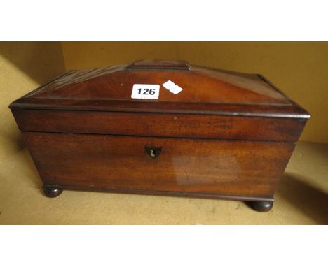 A Regency mahogany tea caddy of sarcophagus form, with fitted interior, on bun feet, 7 x 13 2/8 x 6 6/8