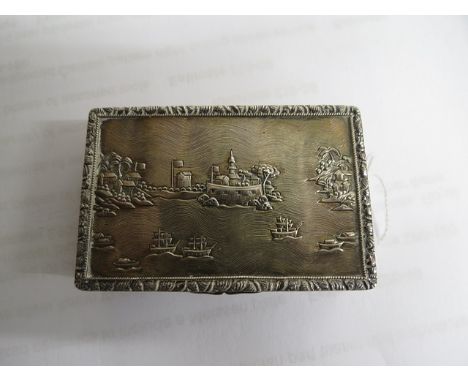 A 19th century oriental silver snuff box with pesudo English hallmarks, probably Chinese, the lid and base decorated with sai