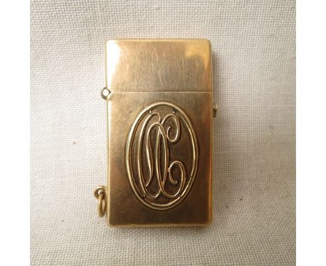 An early 20th century 9ct gold lighter, applied initials within an oval border to the front