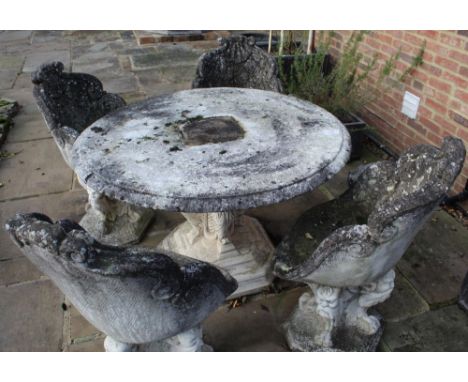 Weathered composite Victorian grotto style circular table on exotic beast column and stepped octagonal support, D120cm H70cm,