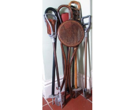 Vintage bamboo and rattan folding shooting stick, a bentwood shooting stick with rattan seat, two Gamebird shooting sticks, e