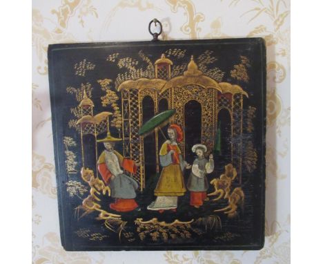 C20th wooden panel, Chinoiserie decorated with figures in a garden landscape on a black ground, H28cm W28cm, painted pseudo c