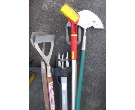 Collection of garden tools including Fiskars weed puller, lawn hedger, long handled fork, etc 