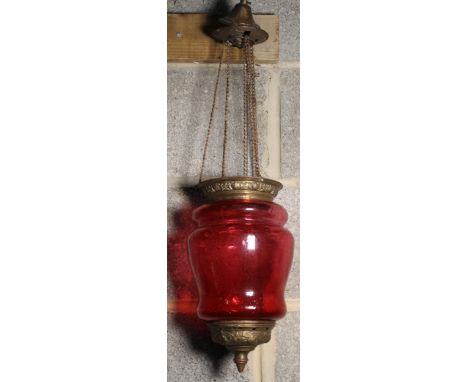 Early C20th Wiman brass mounted ruby glass lamp enclosure on three suspension chains H28cm D18cm 