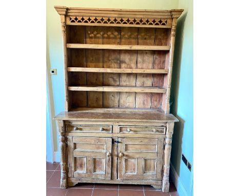 Victorian and later waxed pine dresser, three shelf back with pierced frieze, the base with two moulded drawers and three pan