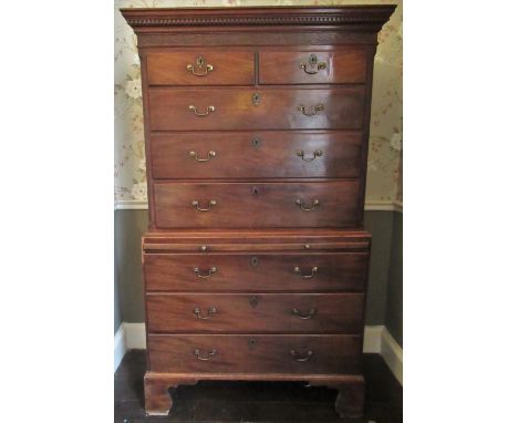 Geo.III mahogany chest on chest, with dentil cornice and blind fret frieze above two short and three long drawers enclosed by