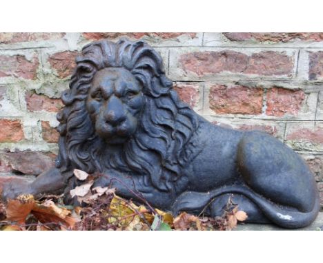 Cast iron half model of a recumbent lion, W66cm H35cm 