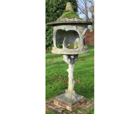 Victorian rustic style weathered composition dovecote or bird table, tapering top with bird finial on naturalistic tree branc