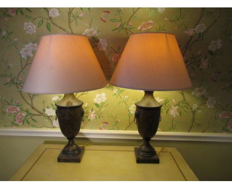 Pair of Regency toleware style table lamps, urn shaped bodies with lion mask and ring handles on stepped square bases, with s