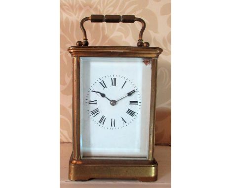 C20th French brass carriage clock, white enamel Roman dial in four bevel glass case, twin train movement   striking the half 