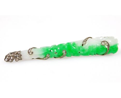 A fine Chinese jade bar brooch, with white gold, platinum and diamond set mount, the naturalistic leaf carved and pierced tap