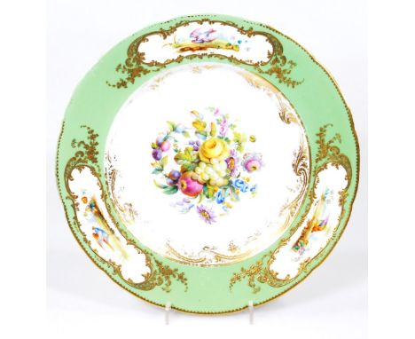 A French 18thC Sevres plate, decorated with fruit and flowers to the the centre with a apple grand green border with panels o