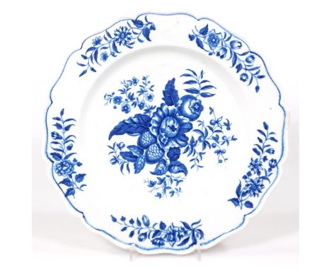 A first period Worcester blue and white painted dinner plate, c.1770, decorated with pine cone pattern, minor rim chip, 24cm 