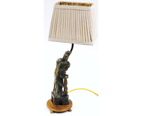 A 20thC Chinese table lamp, with jade style figure of a lady stem, on circular metal base with modern fittings and a material