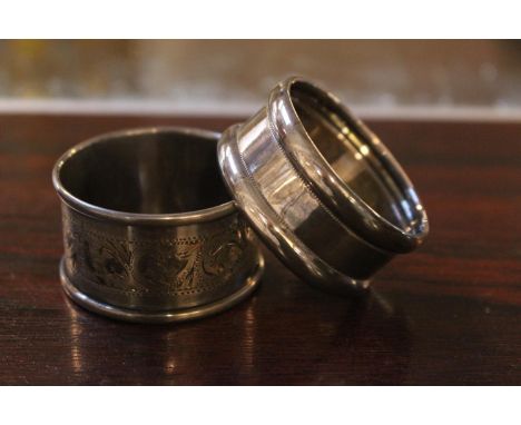 Boxed Silver Napkin ring and a Silver plated Napkin ring 