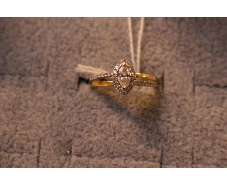 Ladies 18ct Gold Diamond Set Solitaire ring 0.24ct Central stone 0.17ct surrounding 3.7g total weight 