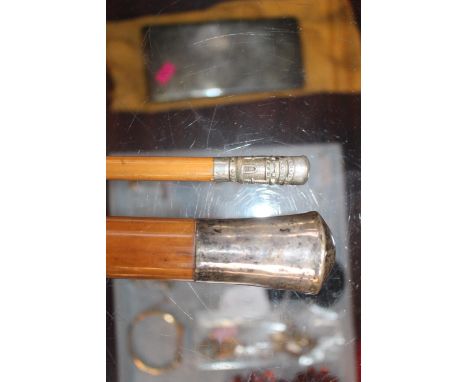 Suffolk Regiment Swagger stick and a Silver topped Cane 