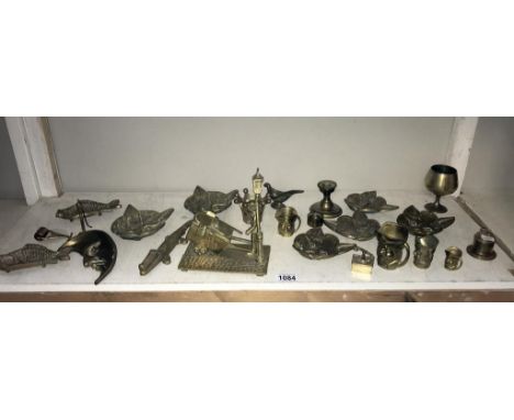 A selection of brassware including cat head, dishes &amp; crocodile nut cracker etc.