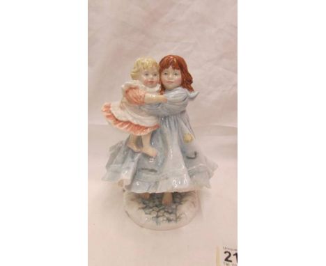 Two Royal Worcester figurines - "Love" and "Lullaby".