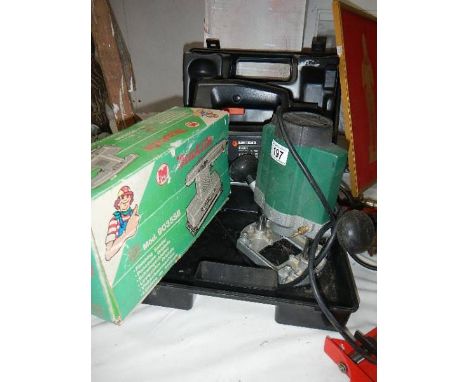 A boxed jig saw, router and sander. (collect only)
