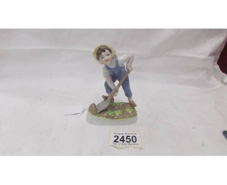 A Royal Worcester figurine - Saturday Boy.