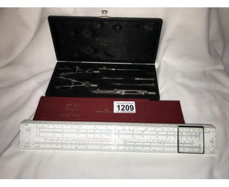 A cased set of draughtsman tools &amp; a cased PIC slide rule