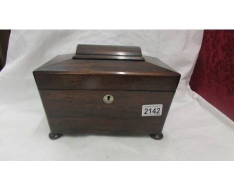 A Victorian mahogany tea caddy complete with glass mixing bowl.