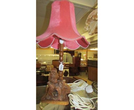 A carved wood owl table lamp with shade. (Collect only)