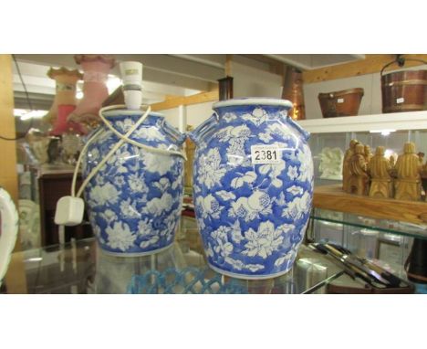 A pair of blue and white Chinese style table lamp bases (one with fittings, one without),  (Collect only) ****Condition repor