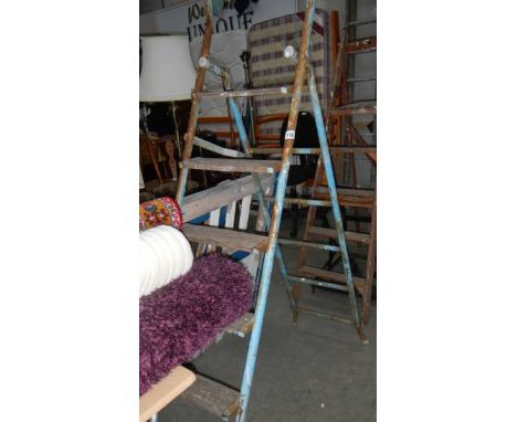 A metal and wood step ladder. (collect only)
