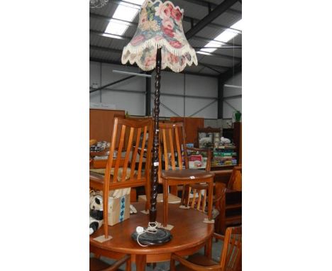 A barley twist wooden standard lamp with shade. (collect only)