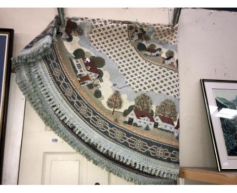 A large round tapestry style wall hanging/table cloth (diameter 190cm approximately)