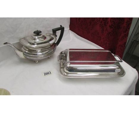 A silver plate teapot and a silver plate tureen.