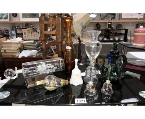 A selection of glass ware including ship in bottle &amp; light bulb, bells, vases &amp; ornate green oil bottle