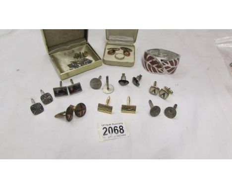 A good lot of cuff links, tie clips, silver ring and bangle.