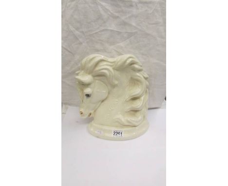 A Kruger sculpture, hand made in Cornwall horse, signed S T K, 26 cm high.