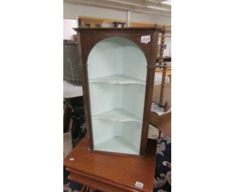 A small corner shelf unit. (collect only)