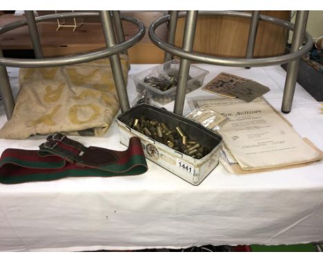 A collection of Militaria including quantity of used ammunition from .44 Magnum, badges, bag &amp; belt etc.