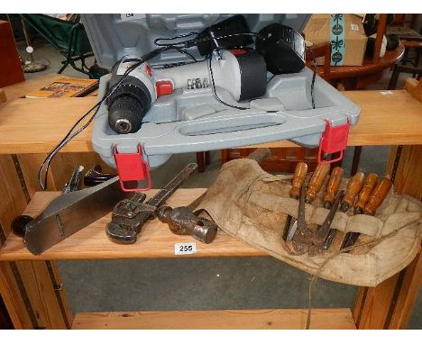 A good lot of tools including chisels.
