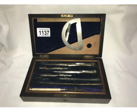 An Edwardian mahogany cased geometry set