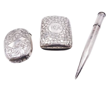 Victorian silver vesta case, with foliate engraved decoration, circular monogramed panel, and central lift up cover, hallmark