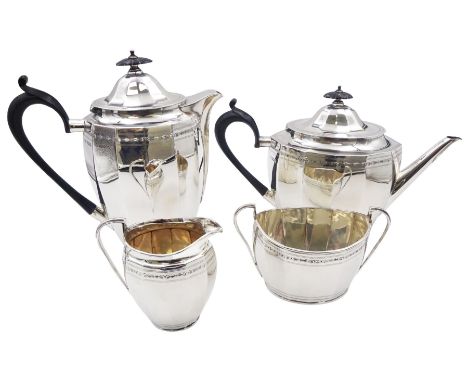 1920's silver four piece tea service, comprising teapot, hot water pot, twin handled sucrier, and milk jug, each of oval face