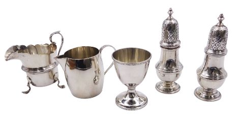 Victorian silver milk jug, of plain barrel form, with strap handle, hallmarked Jonathan Wilson Hukin &amp; John Thomas Heath,