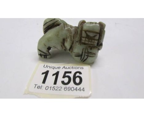 A small jade Dog of Fo.