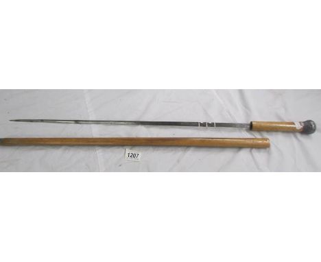 An old sword stick, 90 cm, blade 70 cm.