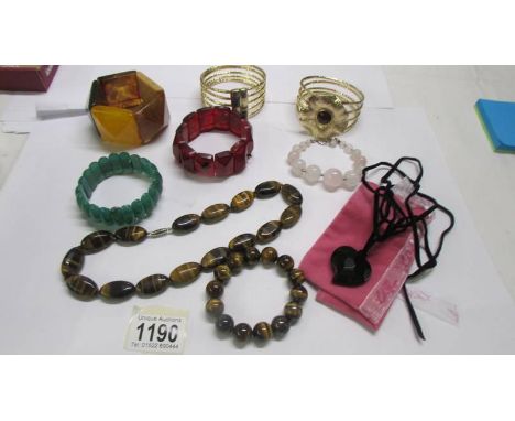 A good collection of bracelets including Lola Rose and a jade example.