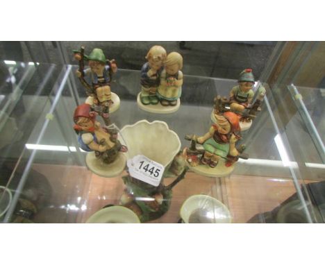 Five Goebel figures.