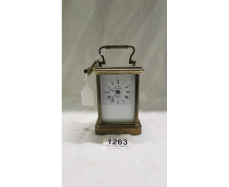 A French brass carriage clock.